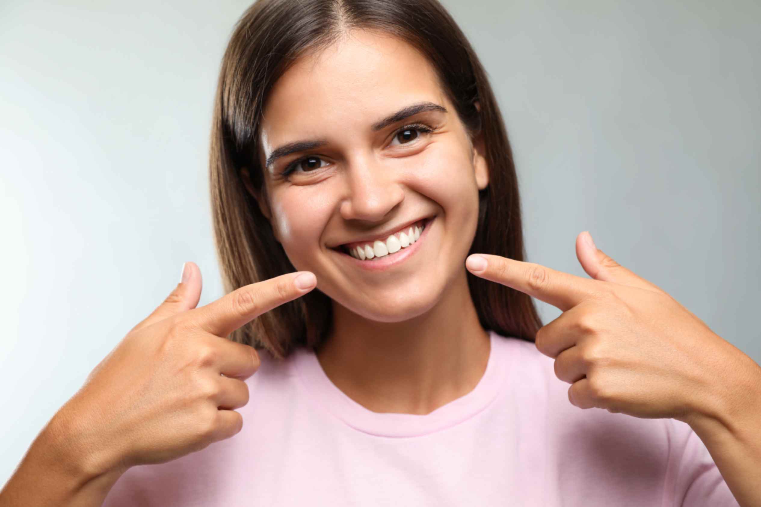 Straight teeth improving oral health and hygiene benefits